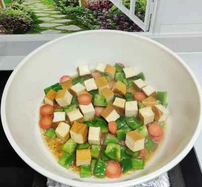 ピーマン、ニンジン、角切り豆腐の炒め物の作り方：4