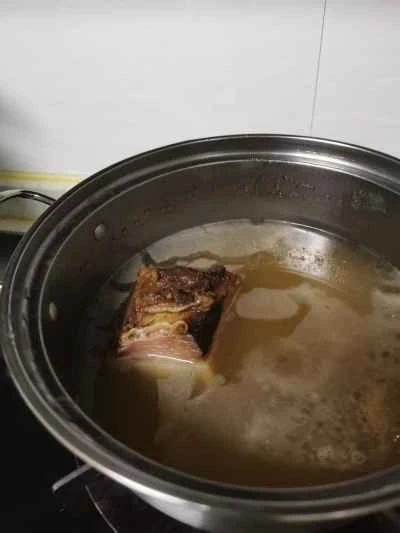 カポックの花と​​豚肉の煮込み炒めの作り方：6