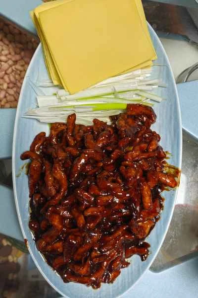 細切り豚肉の甘豆ソース煮込みのレシピ